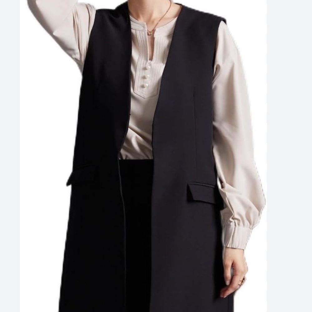 Ricki’s Open Front Vest
